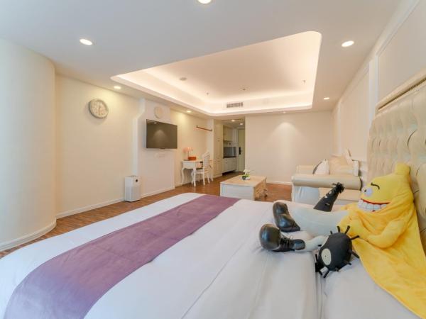 The Legend Hotel- Free Deliver Service to Canton Fair Complex During Canton Fair Period : photo 5 de la chambre chambre lit queen-size deluxe