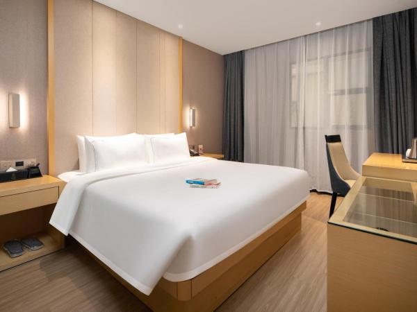 Yizhi Hotel - West Sports Road Metro Station : photo 1 de la chambre chambre supérieure lit queen-size