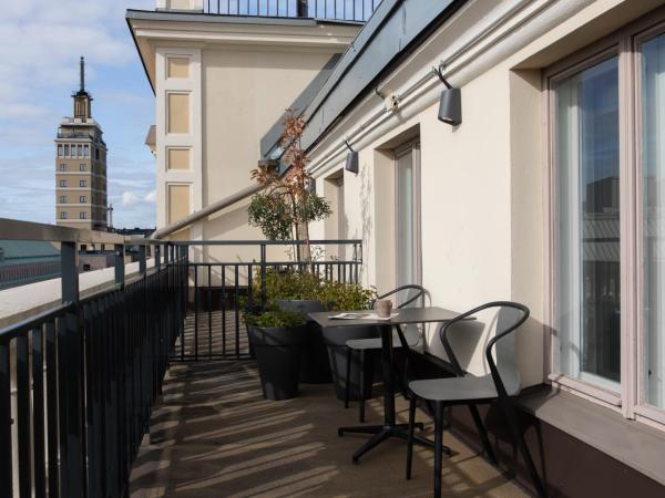 Hotel St. George Helsinki : photo 1 de la chambre chambre atelier avec balcon