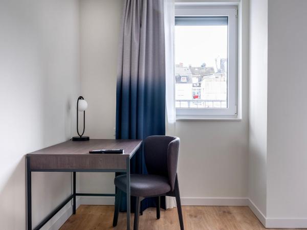 numa I Leo Apartments : photo 5 de la chambre studio familial