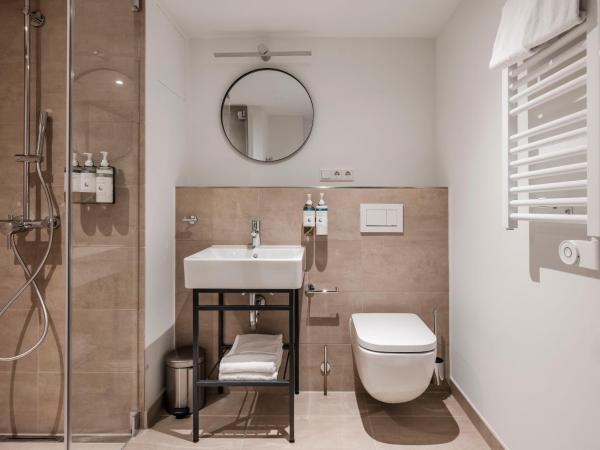 numa I Leo Apartments : photo 10 de la chambre studio familial