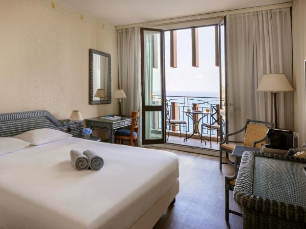 UNAHOTELS Capotaormina : photo 1 de la chambre chambre double ou lits jumeaux deluxe - vue sur mer