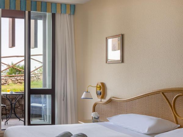 UNAHOTELS Capotaormina : photo 2 de la chambre chambre double ou lits jumeaux supérieure - vue sur jardin