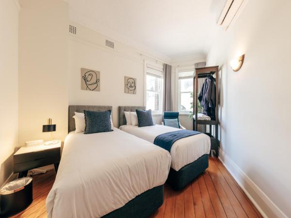 Gaslight Inn - Adults Only : photo 1 de la chambre chambre lits jumeaux avec salle de bains commune