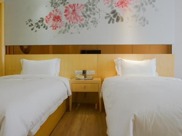 Paco Hotel Ouzhuang Metro Guangzhou-Free shuttle to Canton fair : photo 3 de la chambre chambre lits jumeaux deluxe