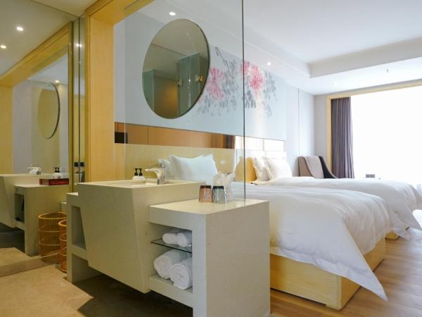 Paco Hotel Ouzhuang Metro Guangzhou-Free shuttle to Canton fair : photo 1 de la chambre chambre lits jumeaux deluxe