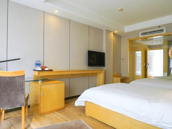 Paco Hotel Ouzhuang Metro Guangzhou-Free shuttle to Canton fair : photo 6 de la chambre chambre lits jumeaux deluxe
