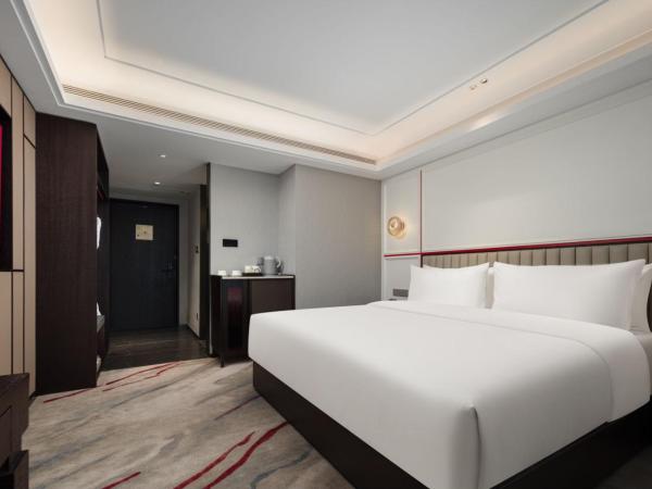 Mövenpick by Accor Binjiang Nanjing : photo 2 de la chambre chambre lit king-size Élégante