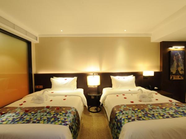 Chao Man Hotel - Guangzhou Railway Station Sanyuanli Metro Station : photo 6 de la chambre chambre lits jumeaux supérieure