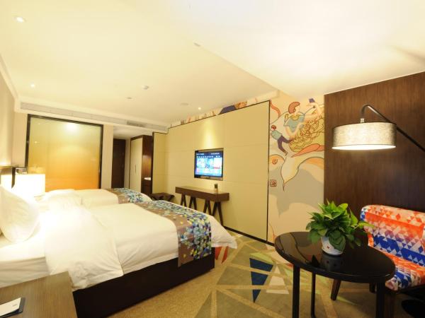 Chao Man Hotel - Guangzhou Railway Station Sanyuanli Metro Station : photo 4 de la chambre chambre lits jumeaux supérieure