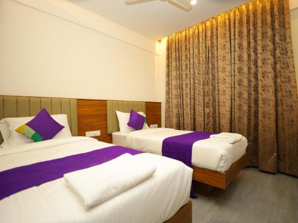 Silverkey Hotel Yelahanka : photo 2 de la chambre chambre double ou lits jumeaux