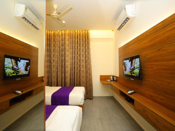 Silverkey Hotel Yelahanka : photo 3 de la chambre chambre double ou lits jumeaux