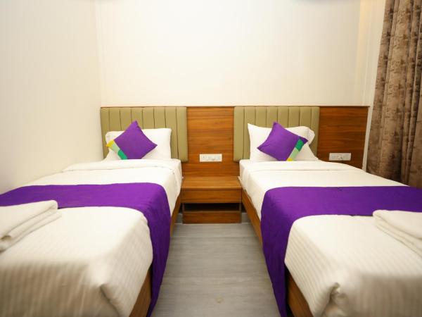 Silverkey Hotel Yelahanka : photo 4 de la chambre chambre double ou lits jumeaux