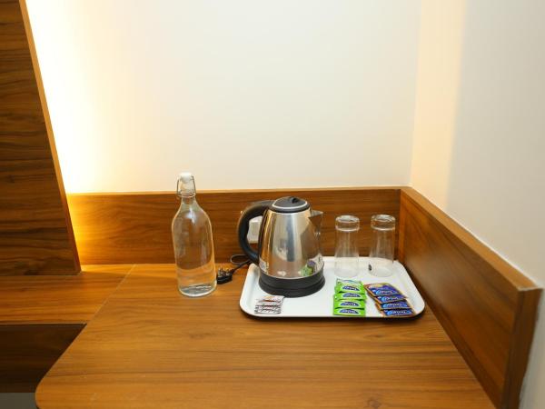 Silverkey Hotel Yelahanka : photo 6 de la chambre chambre double ou lits jumeaux