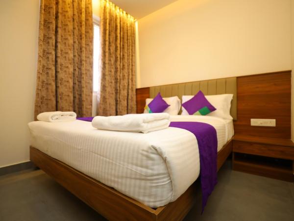 Silverkey Hotel Yelahanka : photo 1 de la chambre chambre deluxe