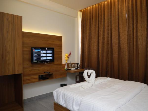 Silverkey Hotel Yelahanka : photo 3 de la chambre chambre deluxe