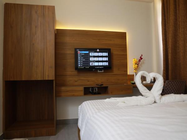 Silverkey Hotel Yelahanka : photo 4 de la chambre chambre deluxe