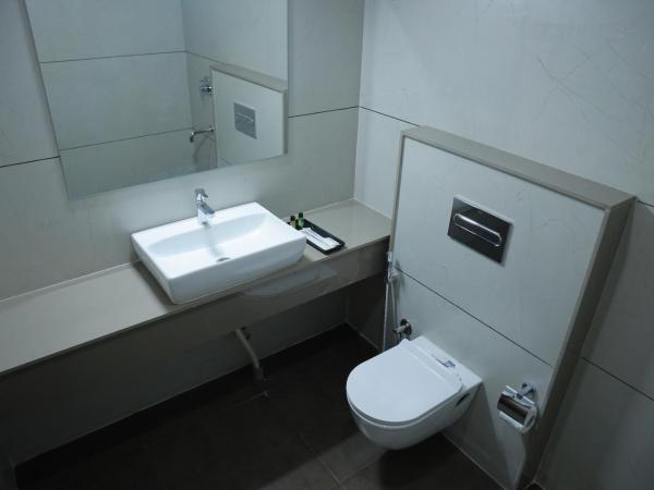 Silverkey Hotel Yelahanka : photo 8 de la chambre chambre deluxe