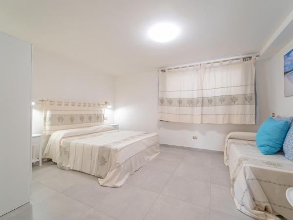 Brorent Affittacamere moro dream : photo 3 de la chambre chambre triple avec salle de bains privative