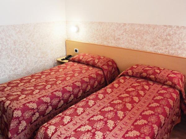 Hotel Nettuno : photo 2 de la chambre chambre lits jumeaux