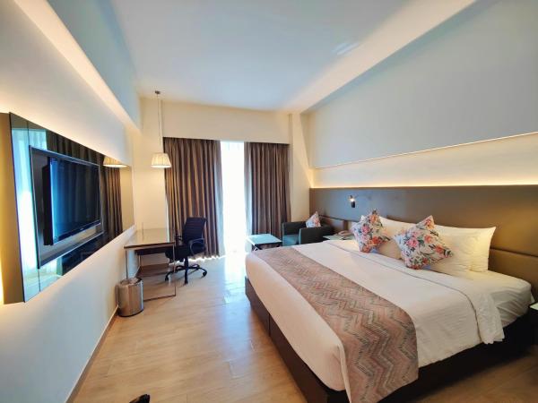 Regenta Central Grand Exotica : photo 6 de la chambre chambre double deluxe