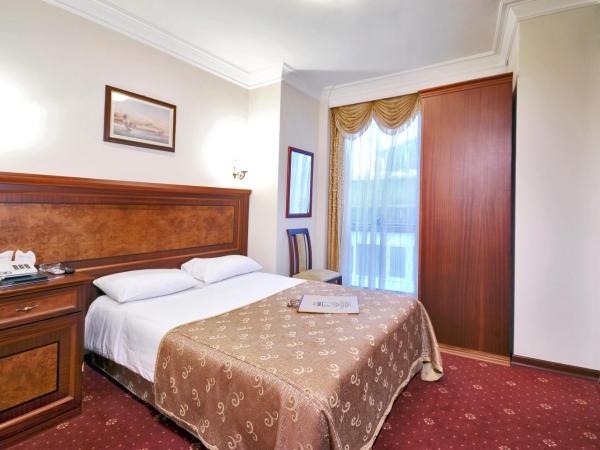 Grand Eyuboglu Hotel : photo 3 de la chambre chambre double ou lits jumeaux