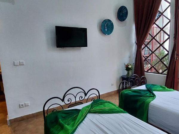Riad Ramzi : photo 3 de la chambre chambre lits jumeaux standard