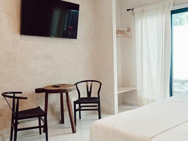 Hotel Boutique KAA : photo 6 de la chambre chambre lit king-size - vue sur piscine