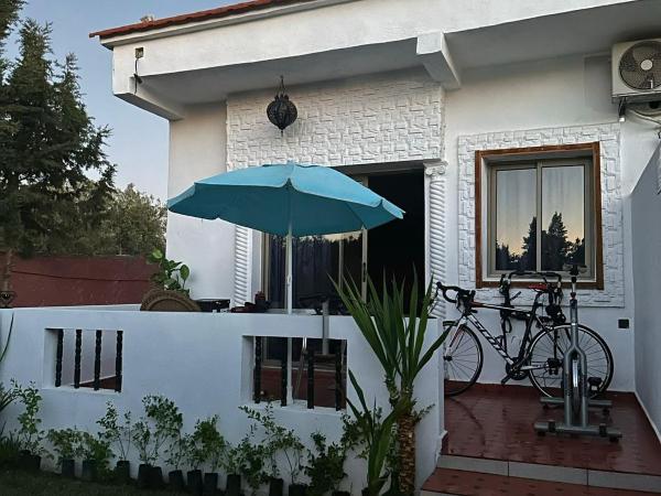 Maison d'hôtes La Ferme AZIZA : photo 6 de la chambre bungalow - vue sur jardin