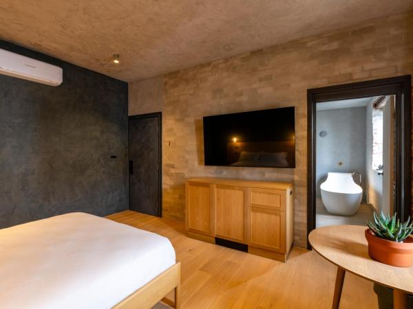 In The Brick Spa And Hotel : photo 2 de la chambre chambre double deluxe