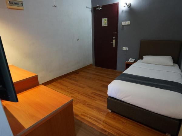 Zen Zeng Hotel : photo 1 de la chambre chambre simple