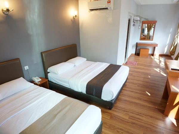 Zen Zeng Hotel : photo 1 de la chambre chambre triple deluxe