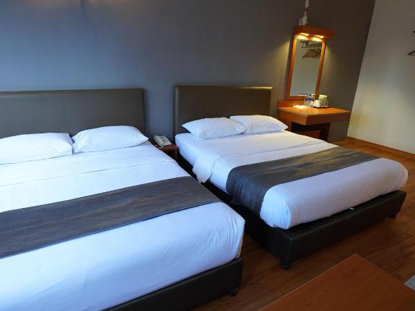 Zen Zeng Hotel : photo 1 de la chambre chambre familiale suite