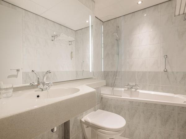 Crown Hotel Eindhoven Centre : photo 1 de la chambre chambre deluxe