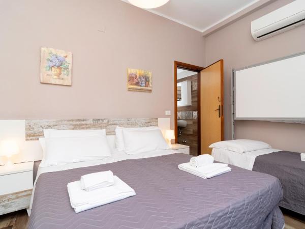 Ostello Le Sirene : photo 2 de la chambre chambre triple