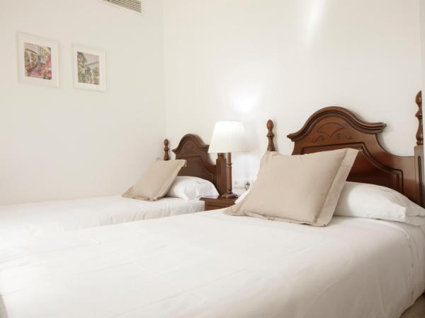 Hotel San Miguel : photo 6 de la chambre chambre lits jumeaux