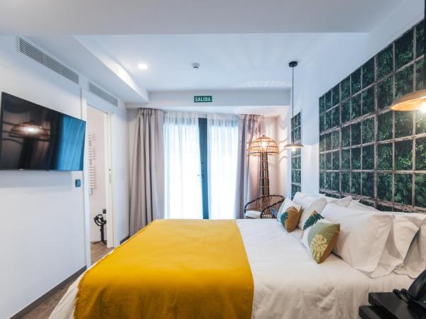 Le Petit Boutique Hotel : photo 8 de la chambre chambre lit queen-size - vue sur jardin