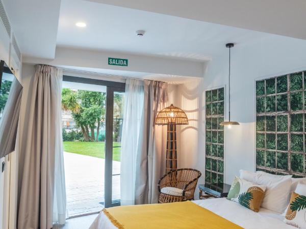 Le Petit Boutique Hotel : photo 4 de la chambre chambre lit queen-size - vue sur jardin