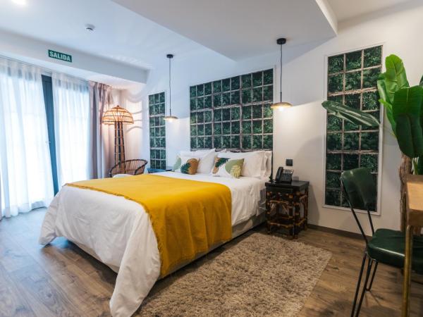 Le Petit Boutique Hotel : photo 10 de la chambre chambre lit queen-size - vue sur jardin