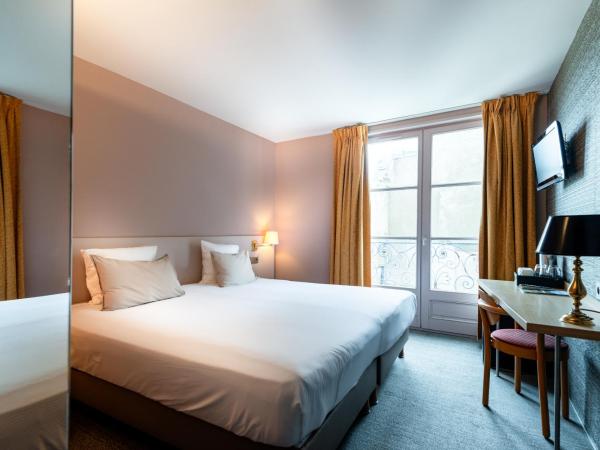 Hôtel de la Cité : photo 1 de la chambre chambre double ou lits jumeaux standard avec vue partielle sur la mer