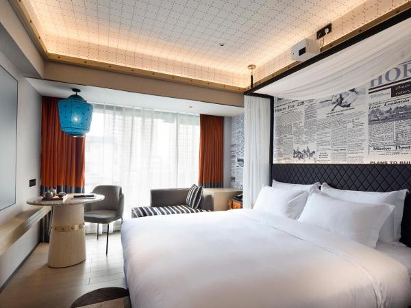 Paco Hotel Canton Tower Pazhou--FreeShuttle Bus for CantonFair : photo 1 de la chambre chambre double avec salle de bains privative