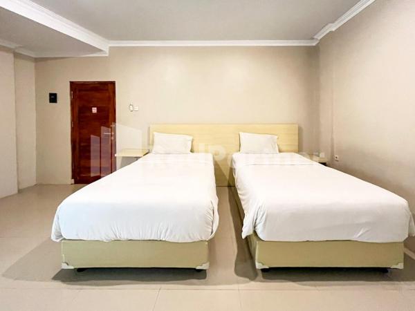 Hotel Andono near YIA Mitra RedDoorz : photo 2 de la chambre chambre lits jumeaux deluxe