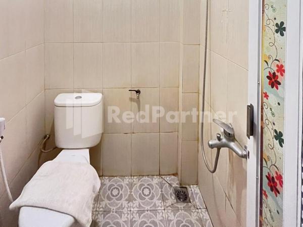 Hotel Andono near YIA Mitra RedDoorz : photo 6 de la chambre chambre lits jumeaux deluxe