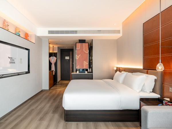 The Puyan Hotel Hangzhou Jiubao : photo 3 de la chambre chambre lit king-size supérieure