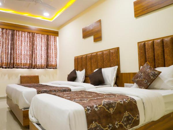 Hotel The Grand : photo 3 de la chambre chambre triple