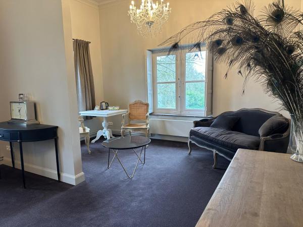 Leyselebeke Castle : photo 9 de la chambre suite - vue sur jardin