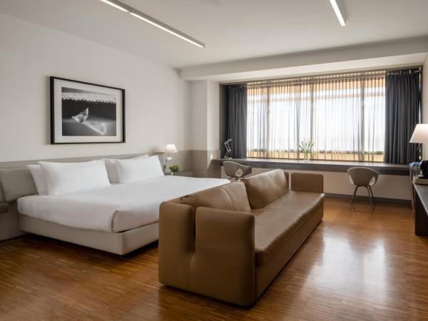 UNAHOTELS San Vitale Bologna : photo 1 de la chambre suite junior double avec canapé-lit