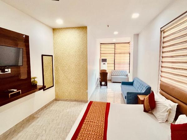 Amora Rooms Dwarka : photo 2 de la chambre chambre triple supérieure