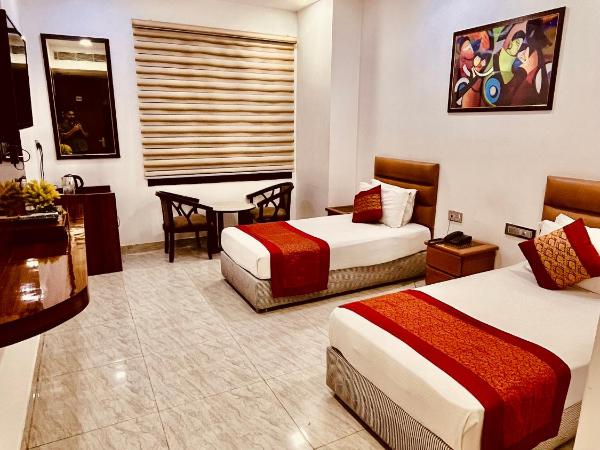 Amora Rooms Dwarka : photo 1 de la chambre deluxe