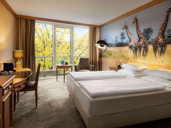 Amedia Hotel & Suites Leipzig, Trademark Collection by Wyndham : photo 2 de la chambre chambre salon